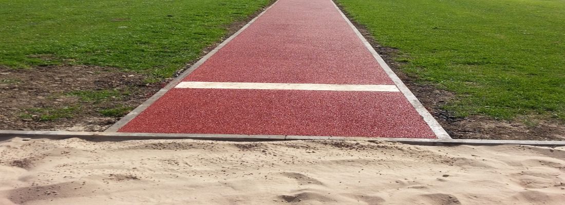 Polymeric Long Jump Pit Installation in Liverpool, Merseyside