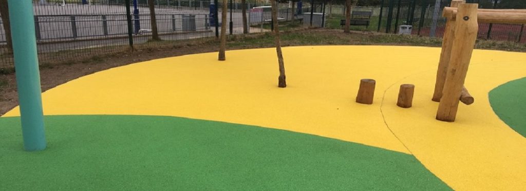 Black Wetpour Play Area With 5% Green Fleck in Swansea