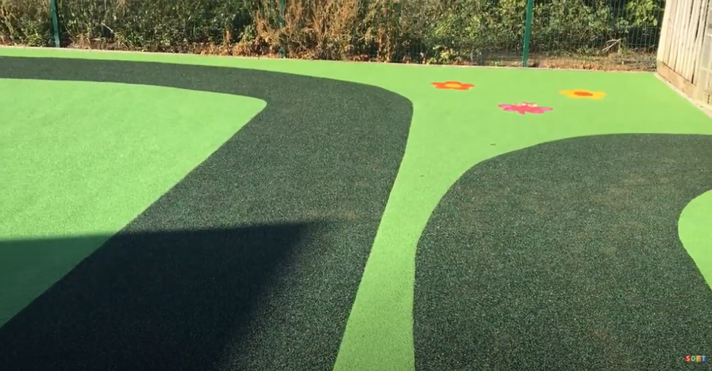 Green Wetpour Flooring with Graphics Install in Exeter