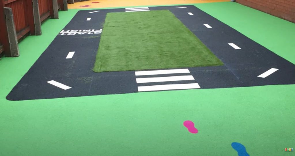 Rubber Playground Flooring With Artificial Grass in Worthing, West Sussex