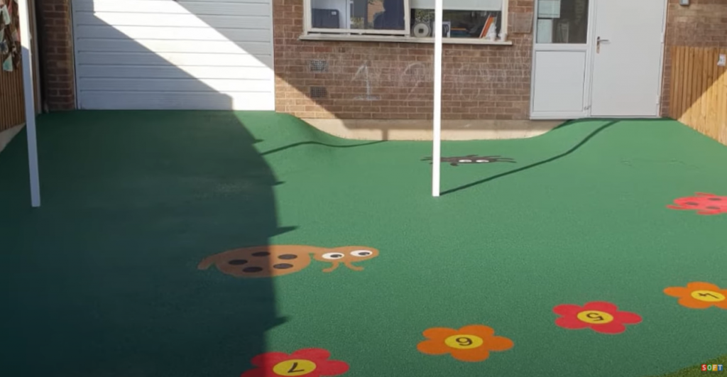 Wetpour Safety Flooring with Graphics at a Nursery in Cheltenham, Gloucestershire